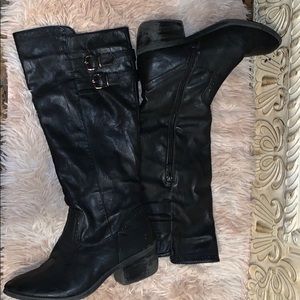 Black boots below the knee